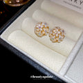 White Floral Cluster Stud Earrings With Gold Accents view 3