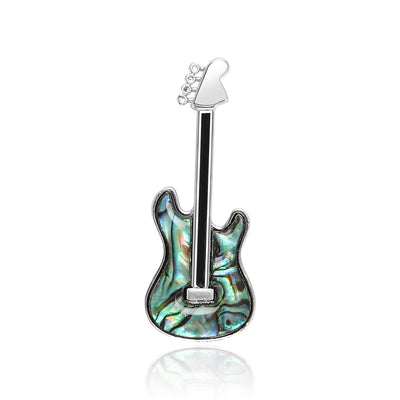 Front product view of the green guitar brooch on a light background