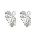 Silver Tone Hollow Bow Pearl Textured Huggie Hoop Earrings view 5