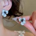 Blue And White Enamel Look Flower Stud Earrings With Dark Centers view 1