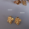 Wrinkled Irregular Textured Metal Stud Earrings Gold Steel Pair view 2