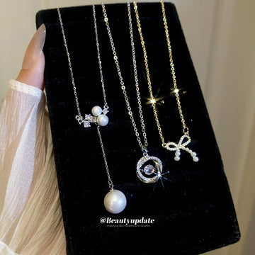 Bow and Pearl Drop Necklace in Three Gold and Silver Styles