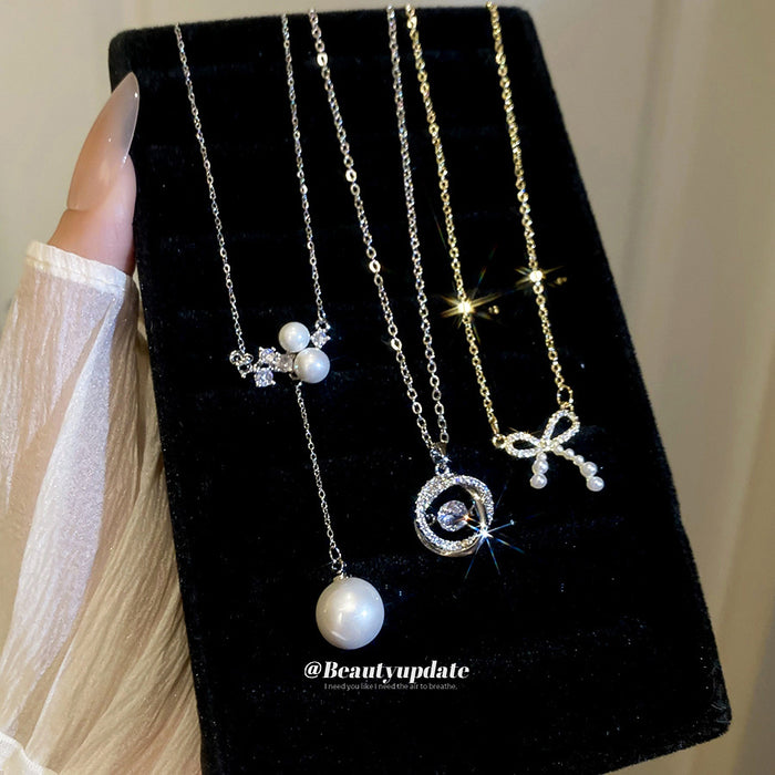 Bow and Pearl Drop Necklace in Three Gold and Silver Styles