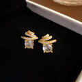 Crystal Meteor Stud Earrings in Gold and Silver Tones view 6