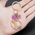 Purple Cat Sakura Pearl and Flower Wreath Enamel Keychain view 4