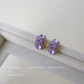 Gold Tone Purple Triple Oval Faceted Stone Half Hoop Earrings view 4