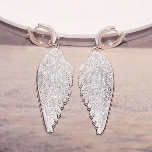 Pave Wing Long Drop Earrings styled close-up