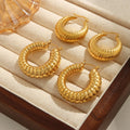 Gold Ribbed Twisted Hoop Earrings Gold And Steel Finishes view 2