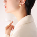 Textured Heart Stud Earrings Gold or Steel Metal Pair view 3