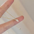 Gold Baguette Rectangular CZ Pendant Necklace Accent view 2