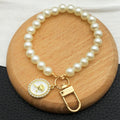 Pearl Loop Rose Medallion Bag Charms in White and Pink view 4