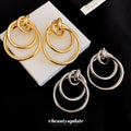 Triple Interlocking Ring Drop Stud Earrings in Gold and Silver view 4