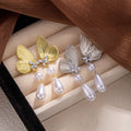Gold and Silver Butterfly Pearl Look Long Earrings view 4