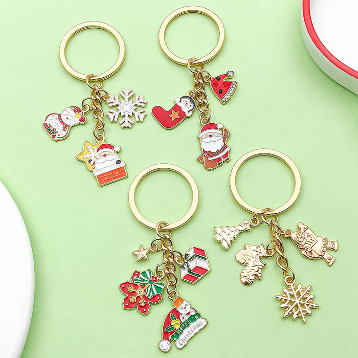 Christmas Charm Keychains Featuring Gold Santa Across 41 Pictured Variations