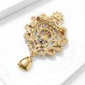 Ornate Filigree Teardrop Brooch in Polished Metal for Jackets and Scarves view 3
