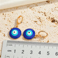 Round Blue Evil Eye Pendant Necklaces and Earrings in Two Finishes view 2