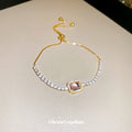 Gold Tone Crystal Slider Bracelet With Pale Pink Rectangular Center Stone view 4