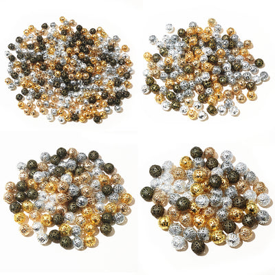 Grouped front view of openwork round metal beads in twenty four size and finish options