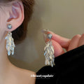 Silver Tone Leaf Tassel Earrings with Gray Pearl Tops view 1