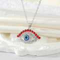 Gold and Silver Tone Red Crystal Lash Eye Pendant Necklaces view 4