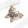Openwork Butterfly Crystal Brooch in Antique Gold Tone view 2
