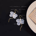 White Translucent Flower Hook Earrings Pearl Gold Wave Tassel view 1