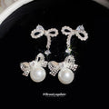 Silver Tone Crystal Bow and Pearl Earrings Statement Jewelry view 1