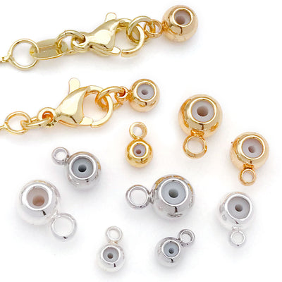 Silicone stopper beads with optional side loops arranged as a full product overview
