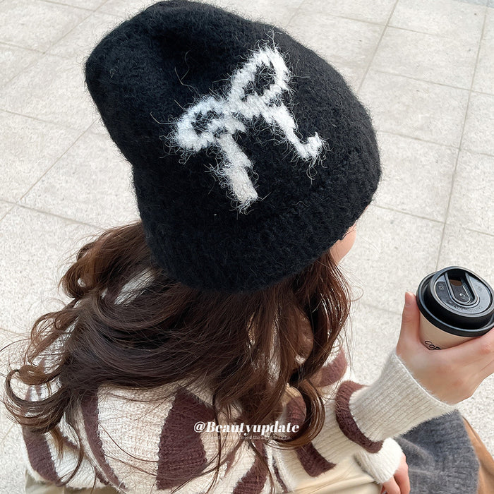 Fuzzy Bow Motif Knit Beanie Hat In Gray And Black Tones