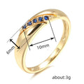 Gold Crossover Band Ring Blue Round Stone Line Accents view 5