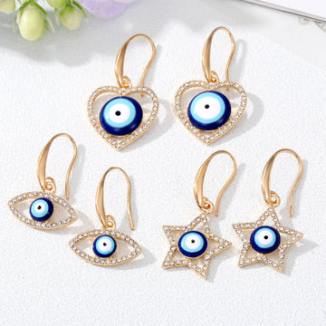 Gold Tone Crystal Heart Star and Evil Eye Hook Earrings