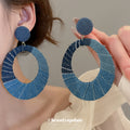 Blue Fabric Wrapped Double Circle Stud Earrings with Polished Metal Details view 1