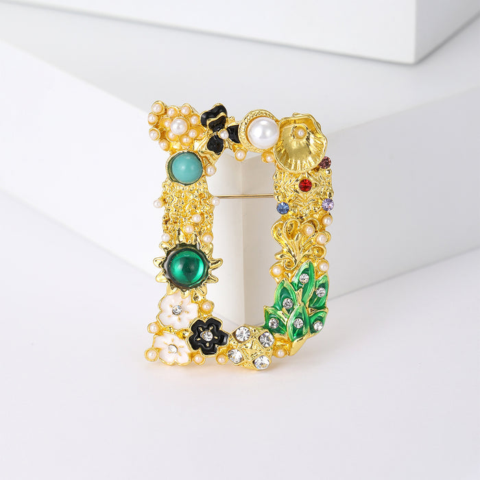 Jeweled Open Letter D Brooch With Colorful Floral Details