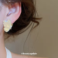 Iridescent Ivory Butterfly Stud Earrings with Metal Settings view 3