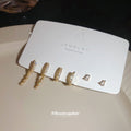 Minimal Gold Tone Stud And Huggie Earring Set Jewelry Design view 2