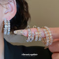 Silver Tone Crystal Hoop Earrings with Layered Oval Drops view 1