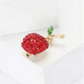 Bright Red Crystal Apple Brooch with Curved Stem and Green Leaf view 2