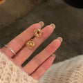 Twisted Knot Metal Clip On Earrings in Two Finishes view 7