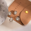 Silver Tone Round Clear Stone Halo Clip and Stud Earrings view 1