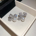 Silver Tone Crystal Bow Stud Earrings With White Pearl Drops view 6