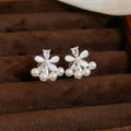 Floral Pearl Clip-On Earrings in Silver and Gold with Polished Metal Details view 6