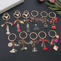 Ten Fashion Dress Lipstick and Handbag Metal Keychain Designs view 2