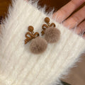 Bow and Faux Fur Pom Pom Stud Earrings in Taupe and Red view 6
