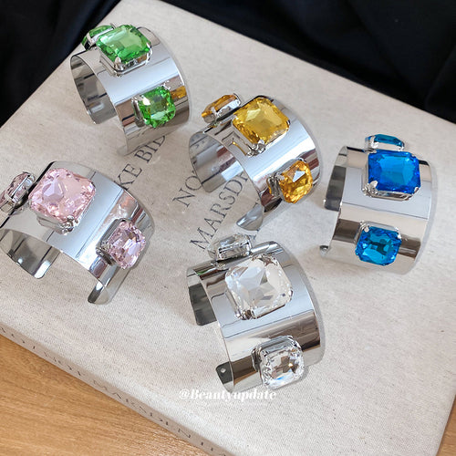 Five silver wide cuffs with pink green amber clear blue crystals