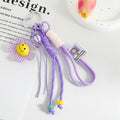 Woven Paracord Flower Keychain with Acrylic Smiley Charm view 3