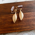 Matte Leaf Drop Clip Earrings in Gold and Silver Tones view 7