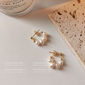 Gold Tone Graduated White Pearl Round Hoop Stud Earrings view 1