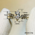 Silver-Tone Feather Band Ring with a Marquise Clear Stone view 5
