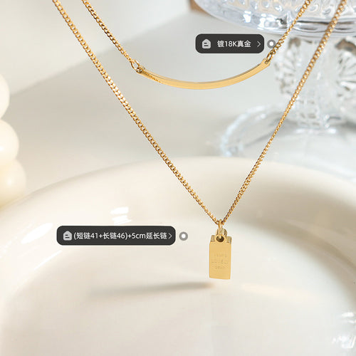Close product view of bar and engraved tag with length labels