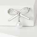 Outline Bow Pearl Drop Brooch in Silver and Gold for Jackets and Scarves view 4